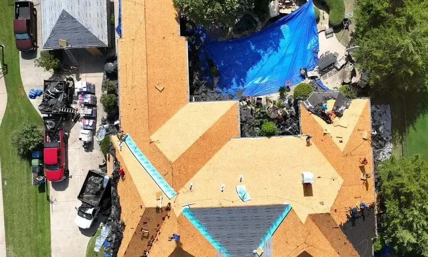 Professional Storm Damage Roof Repair being performed in Brushy Creek